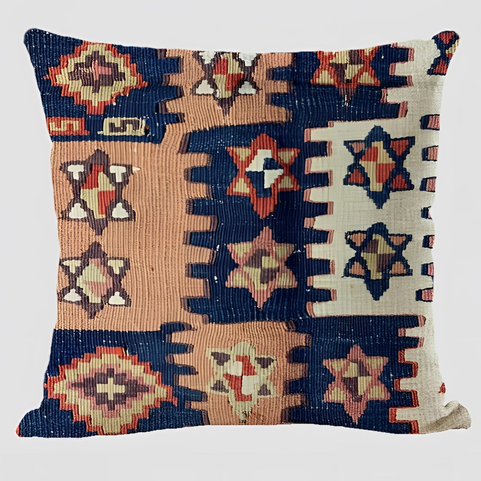 Handwoven kilim cushion with an ethnic bohemian design in shades of magenta and peach, featuring intricate patterns on a rectangular shape, perfect for southwestern decor.