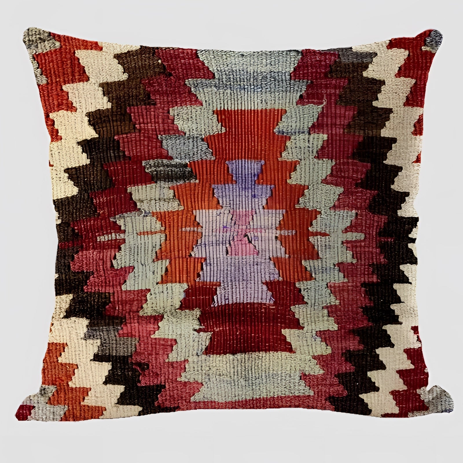 Handwoven Kilim cushion with an ethnic bohemian design, featuring a vibrant geometric pattern with triangles, suitable for Southwestern decor. The rectangular textile showcases intricate creative art and design elements in various tints and shades.