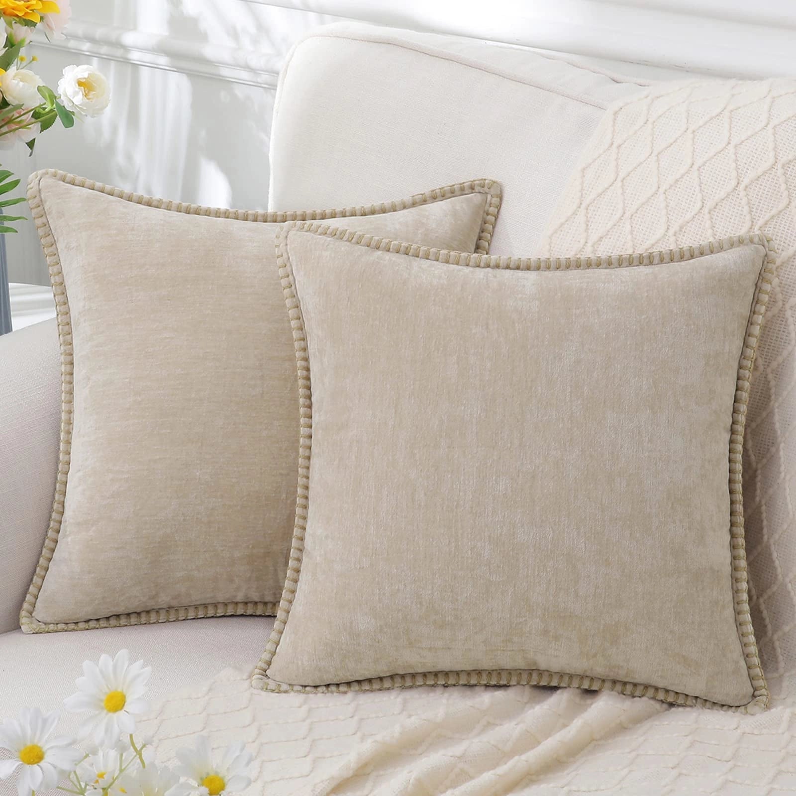 Luxury grey velvet throw pillows in a set of four, featuring an elegant violet hue with a subtle floral pattern, offering a soft and comfortable addition to home decor.